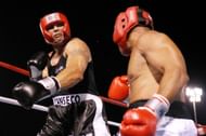 Jose Canseco v Via Sikahema: ATLANTIC CITY, NJ - JULY 12: (L-R) Former Major League Baseball player Jose Canseco (L) swings a left at former NFL player Via Sikahema during their celebrity boxing match on July 12, 2008 at Bernie Robbins Stadium in Atlantic City, New Jersey. (Photo by Nick Laham/Getty Images)